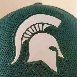 Green Bevel Michigan State Spartans fitted cap.